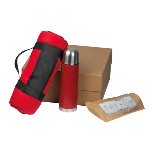 Thee geschenkset met thermoskan, theeverpakking en deken.