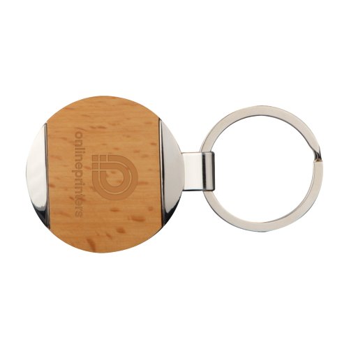 Bruine metalen en houten sleutelhanger met patroon en metalen ring.