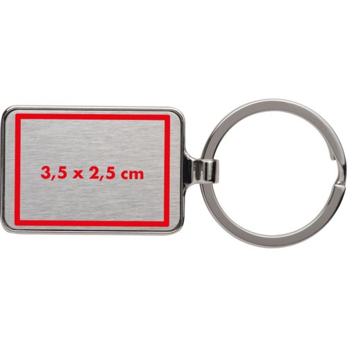 Metalen sleutelhanger met rechthoekige vorm en sleutelring.