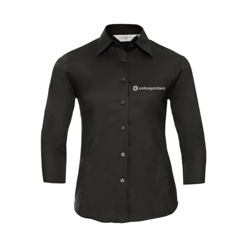 Zwarte blouse met lange mouwen en knoopsluiting.