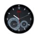 Zwarte wandklok met gentegreerde thermometer en hygrometer.