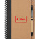 Notitieblok met spiraalbinding en penhouder.